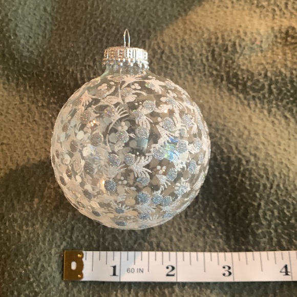 Holiday Living 2 1/2” clear glass with white and silver glitter detailing in box - Picture 4 of 7